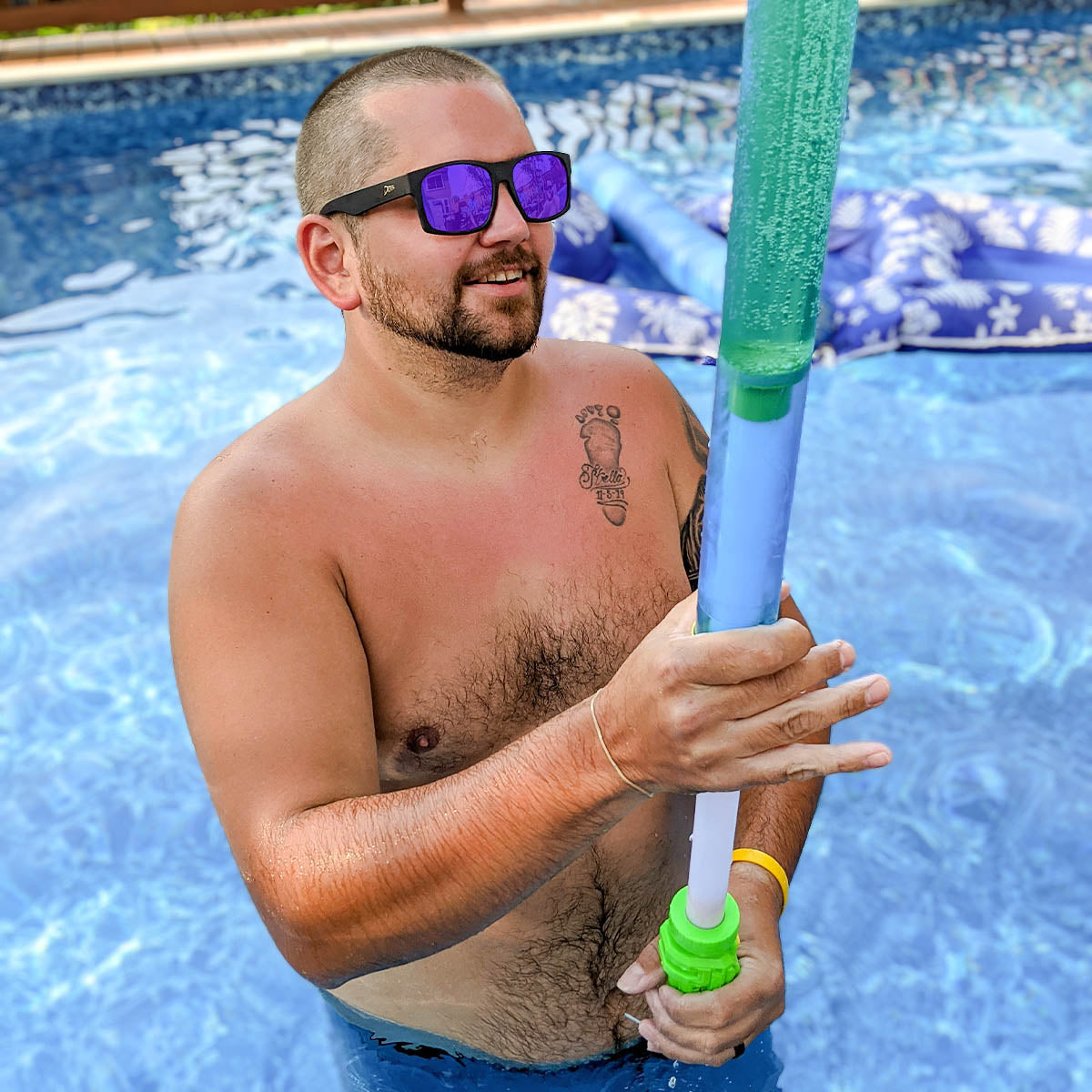 Snowboarder carving through powder in snowy terrain.