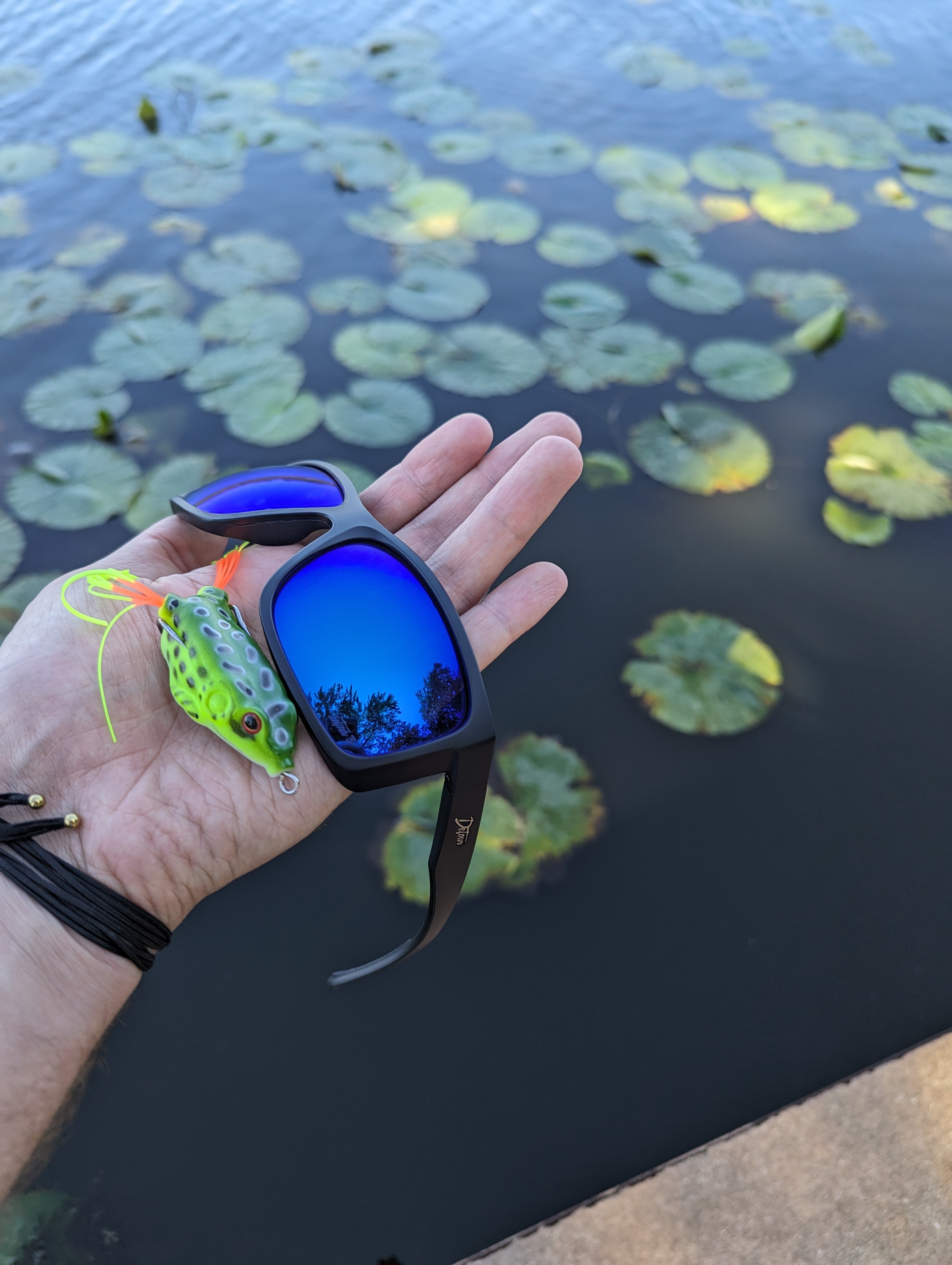 Snowboarder carving through powder in snowy terrain.