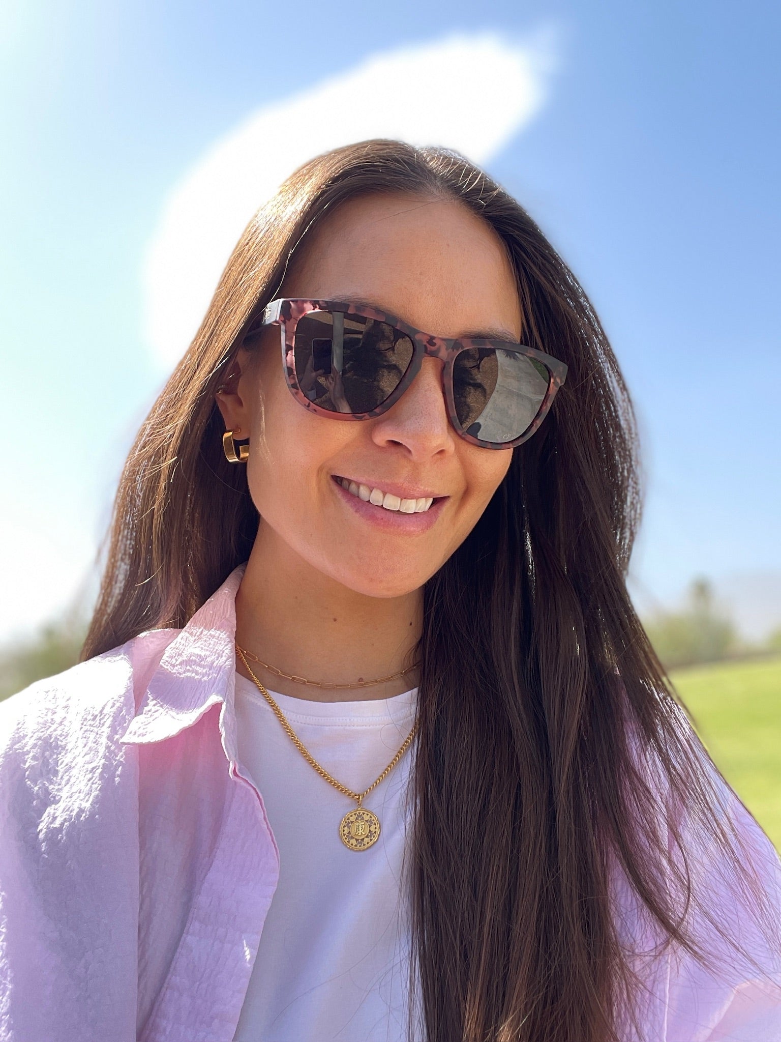 Snowboarder carving through powder in snowy terrain.