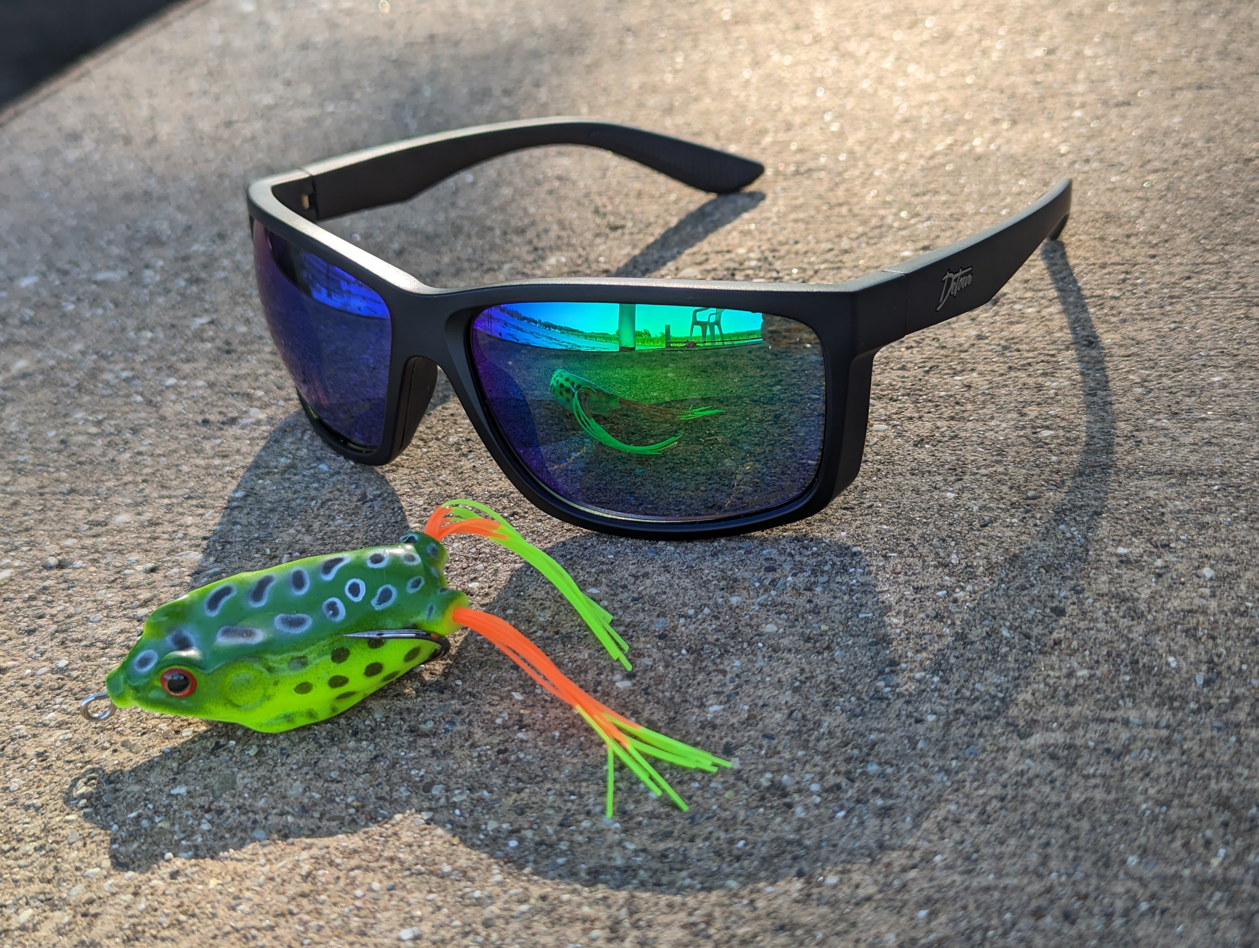 Snowboarder carving through powder in snowy terrain.